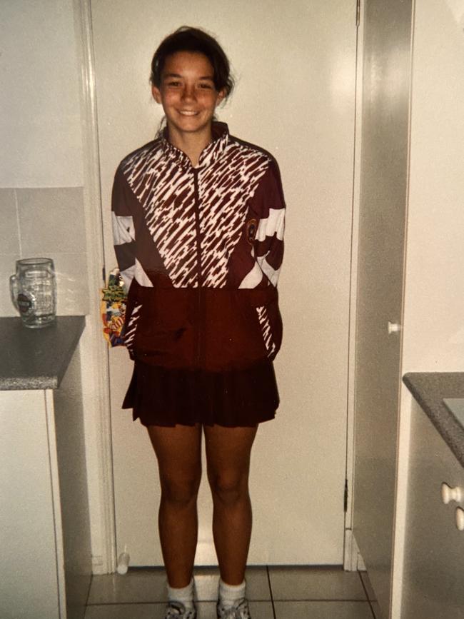 Ricki-Lee in primary school proudly wears her netball uniform.