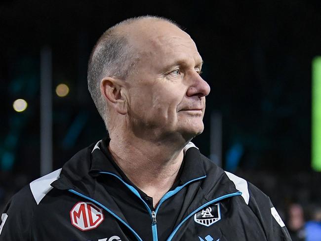 ADELAIDE, AUSTRALIA - SEPTEMBER 13: Ken Hinkley, Senior Coach of the Power  walks off the ground  after  the AFL Second Semi Final match between Port Adelaide Power and Hawthorn Hawks at Adelaide Oval, on September 13, 2024, in Adelaide, Australia. (Photo by Mark Brake/Getty Images)