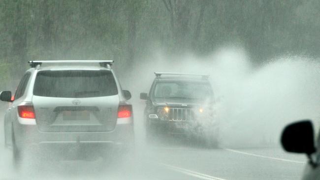 Cars having to battle through floodwaters on Wakehurst Parkway could become a thing of the past. Picture: News Corp