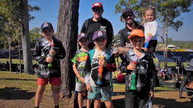 Aaron, Chris holding Alexis (back), with Chase, Eli, Jackson and Nate (frontrow L-R) at the 2023 Darwin Supercars. Picture: Fia Walsh