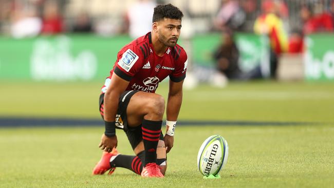 Crusaders flyhalf Richie Mo'unga lines up a kick against the Reds during last week’s 24-20 win in Christchurch. Photo: Teaukura Moetaua/Getty Images