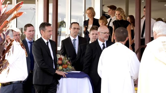 John Ahern (left) with coffin of his father, at the State Funeral Service for Mike Ahern AO, at Our Lady of the Rosary Catholic Church, Caloundra, on Friday 25th August 2023 - Photo Steve Pohlner