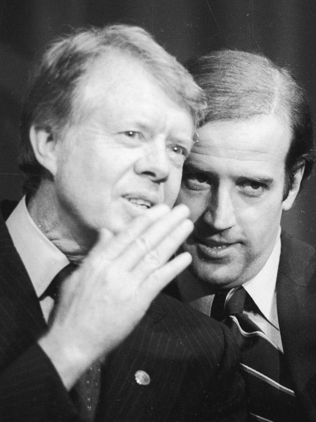 Then Delaware Senator Joe Biden points with President Jimmy Carter.