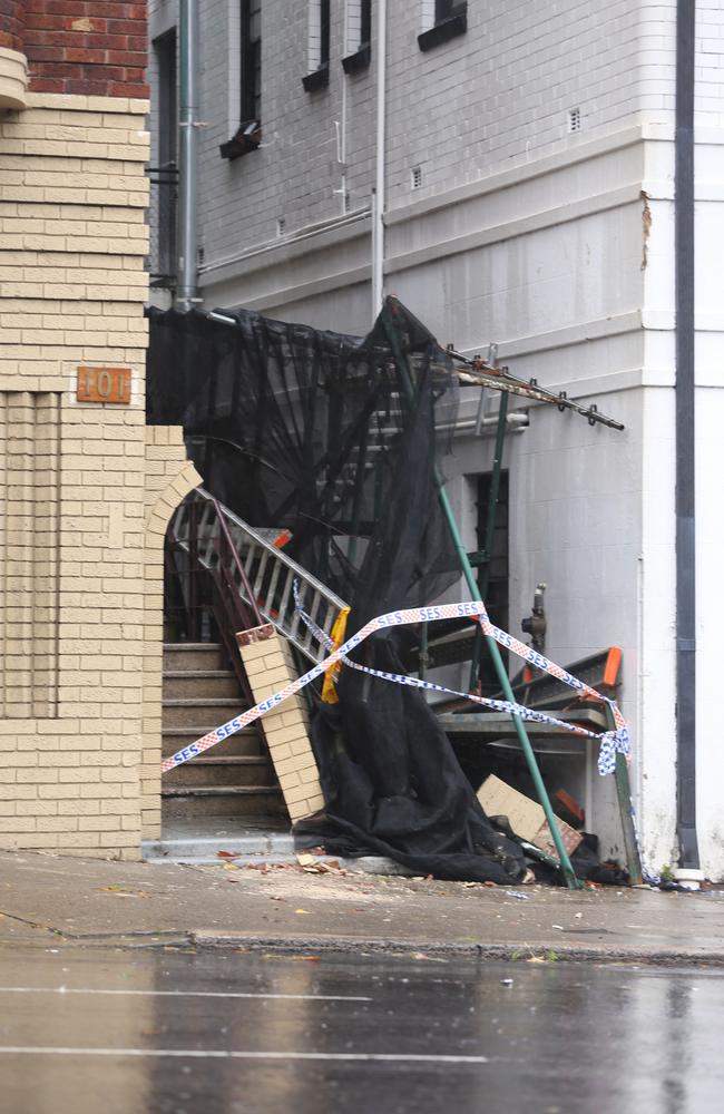 A severe storm still lashing Sydney has caused major damage. Collapsed scaffolding is seen here at Edgecliff, Sydney.