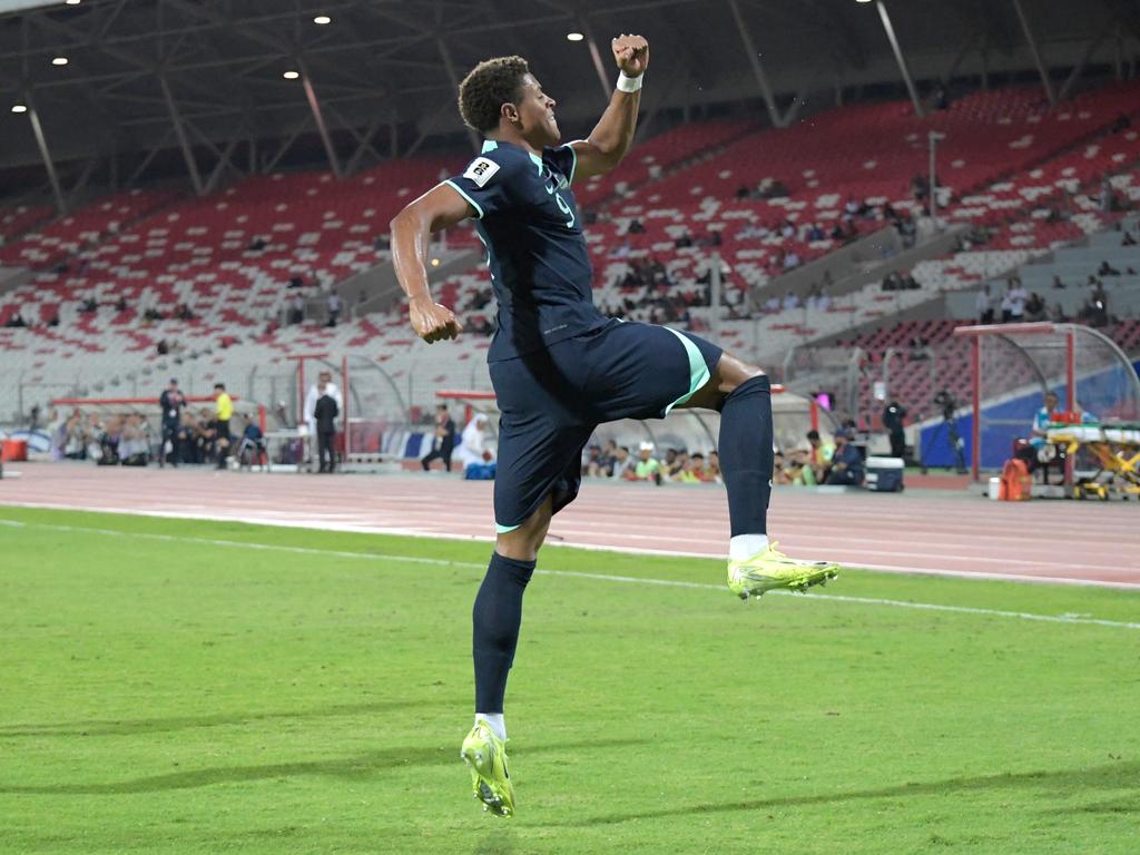 Kusini Yengi celebrates scoring for the Socceroos against Bahrain in November. Picture: Mazen Mahdi / AFP