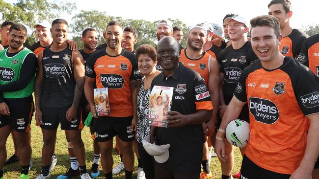 Wests Tigers players get a real life lesson from Super Dub. Image: Brett Costello