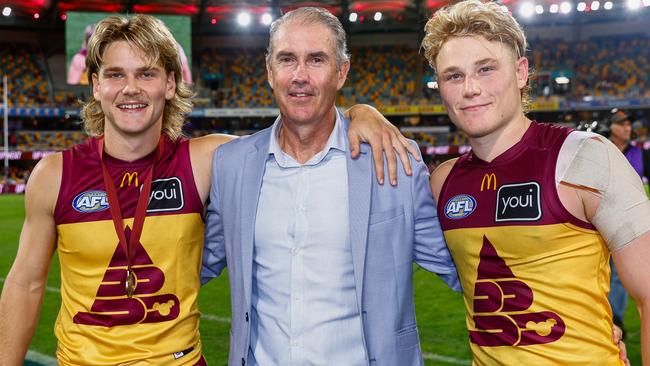 BRISBANE, AUSTRALIA - MAY 04: Will Ashcroft, Marcus Ashcroft and Levi Ashcroft pose for a photo during the 2025 AFL Round 08 match between the Brisbane Lions and the Gold Coast Suns at The Gabba on May 4, 2025 in Brisbane, Australia. (Photo by Russell Freeman/AFL Photos via Getty Images)