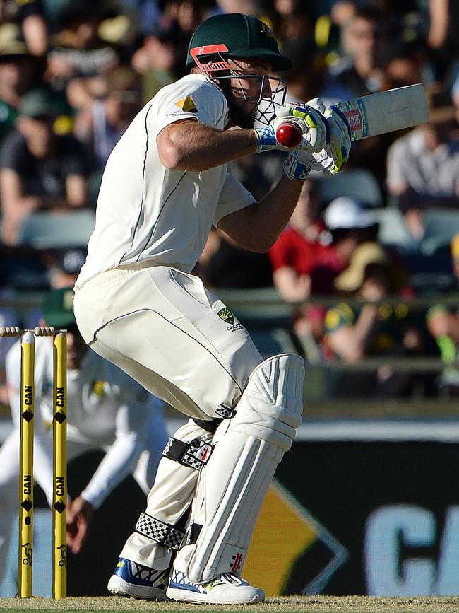 Marsh tries to avoid a bouncer from Dale Steyn. Picture: Daniel Wilkins