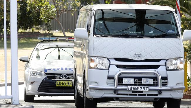 The body of Ivan Milat being driven out of Long Bay Jail on Sunday. Picture: Chris Pavlich