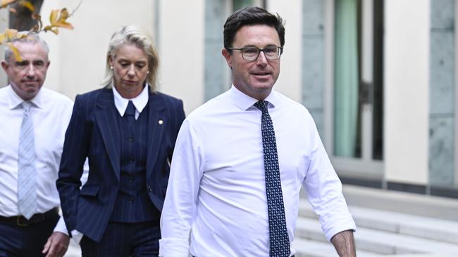 Re-elected leader of the Nationals, David Littleproud, new deputy Kevin Hogan and the party’s leader in the Senate, Bridget McKenzie, leave The Nationals' party room after winning the leadership vote. Picture: NewsWire / Martin Ollman