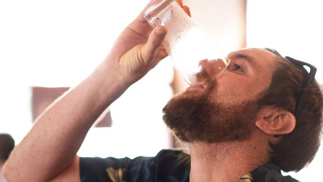 Russell Smith finishes his first beer for the afternoon on the day that pubs reopened after the COVID shutdown last year. Picture: Che Chorley