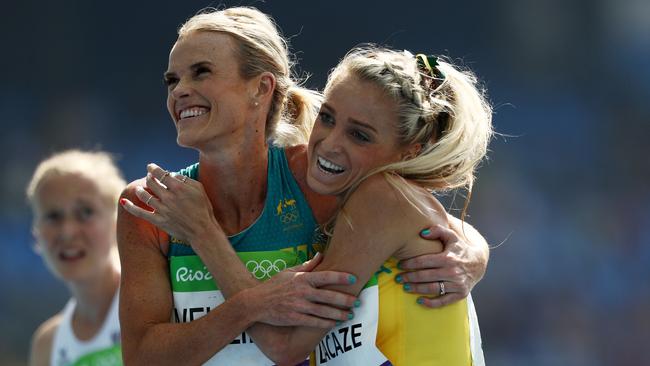 RIO DE JANEIRO, BRAZIL - AUGUST 16: Eloise Wellings (L) and Genevieve Lacaze of Australia react after the Women's 5000m Round 1 - Heat 2 on Day 11 of the Rio 2016 Olympic Games at the Olympic Stadium on August 16, 2016 in Rio de Janeiro, Brazil. (Photo by Patrick Smith/Getty Images)