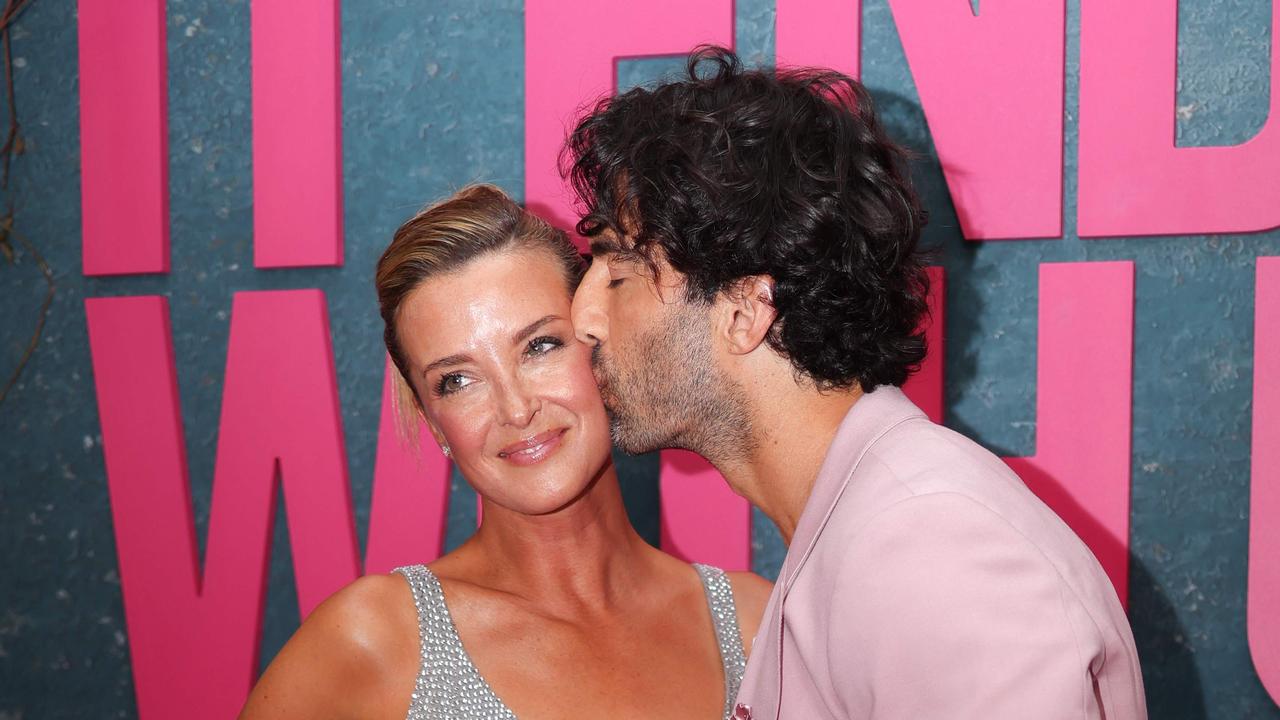 Baldoni kisses his wife Emily Baldoni at the New York premiere of It Ends With Us. Picture: Getty.