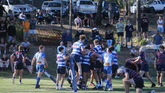 James Duggan (No.11) getting around his teammates last year. Picture by Richard Gosling