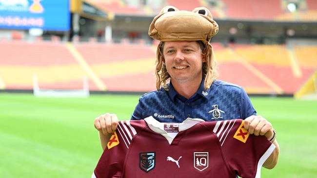 Cameron Smith with a Queensland State of Origin jersey last year in Brisbane. The golfer is more Queensland than XXXX. Picture: Bradley Kanaris/Getty Images