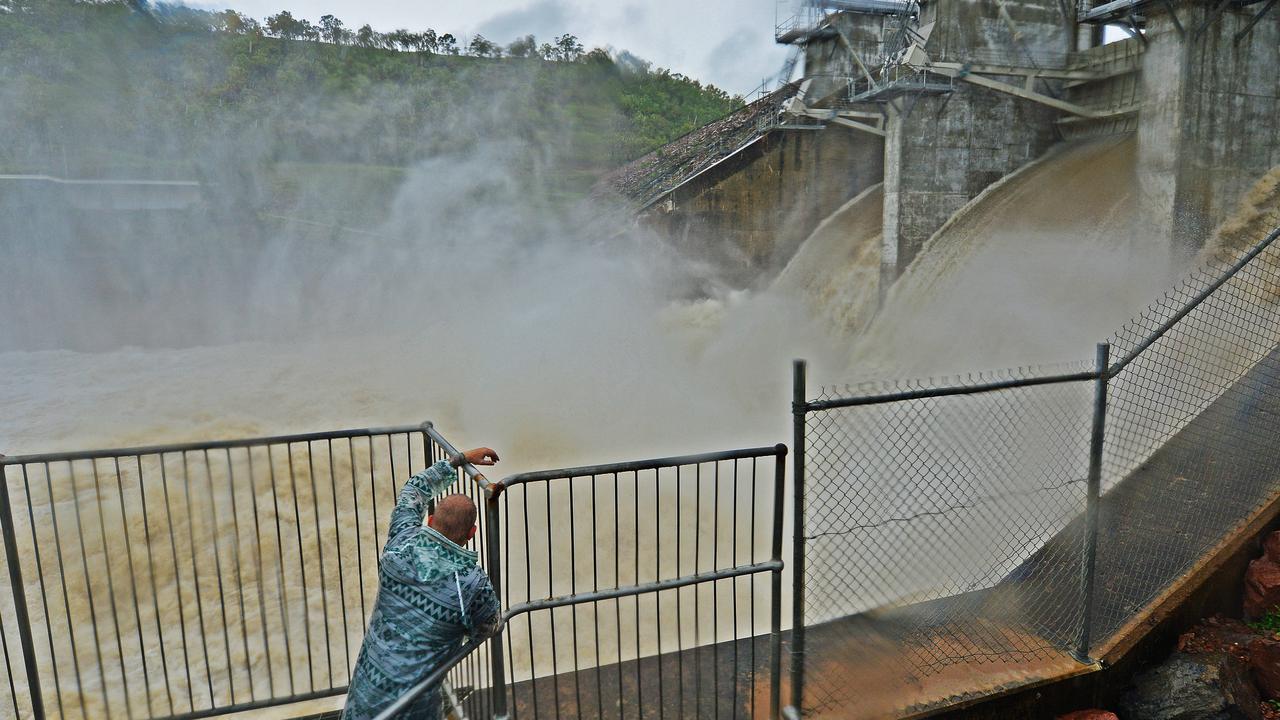 Ross River Dam as it releases water due to flooding rain. Picture: Zak Simmonds