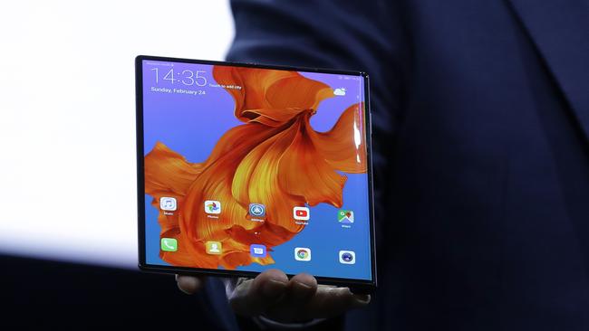 Huawei CEO Richard Yu displays the new Huawei Mate X foldable 5G smartphone at the Mobile World Congress, in Barcelona, Spain. Picture: AP Photo/Manu Fernandez