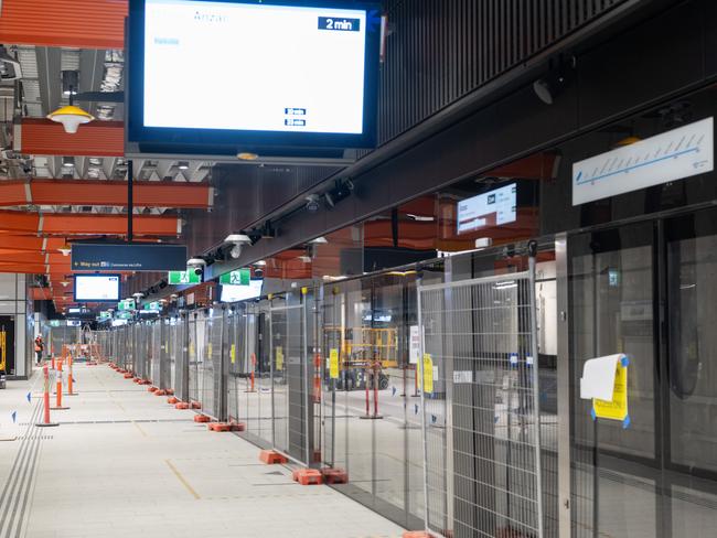 Platform screen doors, as seen behind the gates, will prevent trespassers from accessing the tracks. Picture: Tony Gough