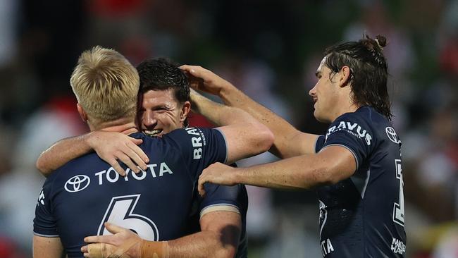 SYDNEY, AUSTRALIA - MARCH 23: Chad Townsend of the Cowboys celebrates scoring a try during the round three NRL match between St George Illawarra Dragons and North Queensland Cowboys at Netstrata Jubilee Stadium on March 23, 2024 in Sydney, Australia. (Photo by Jason McCawley/Getty Images)