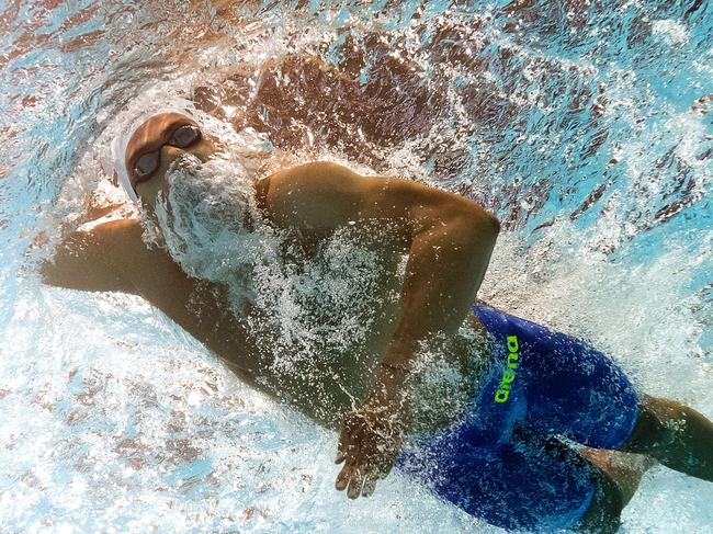 PICTURE TAKEN WITH AN UNDERWATER CAMERA - Greece's Andreas Vazaios competes in the semi-finals of the men's 200m individual medley swimming event at the 2015 FINA World Championships in Kazan on August 5, 2015. AFP PHOTO / FRANCOIS XAVIER MARIT
