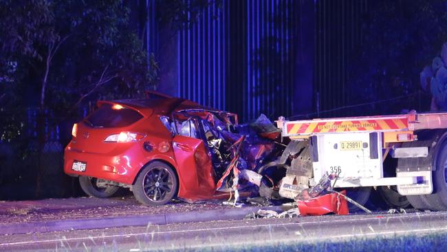 The crumpled car at the scene of a fatal accident on Campbelltown Road in Casula which happened just after midnight. Picture: Steve Tyson