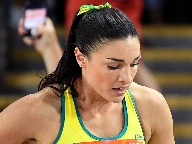 Michelle Jenneke of Australia reacts after finishing fourth in the Women's 100m Hurdles Final on day nine of the XXI Commonwealth Games, at Carrara Stadium on the Gold Coast, Australia, Friday, April 13, 2018. (AAP Image/Dean Lewins) NO ARCHIVING, EDITORIAL USE ONLY