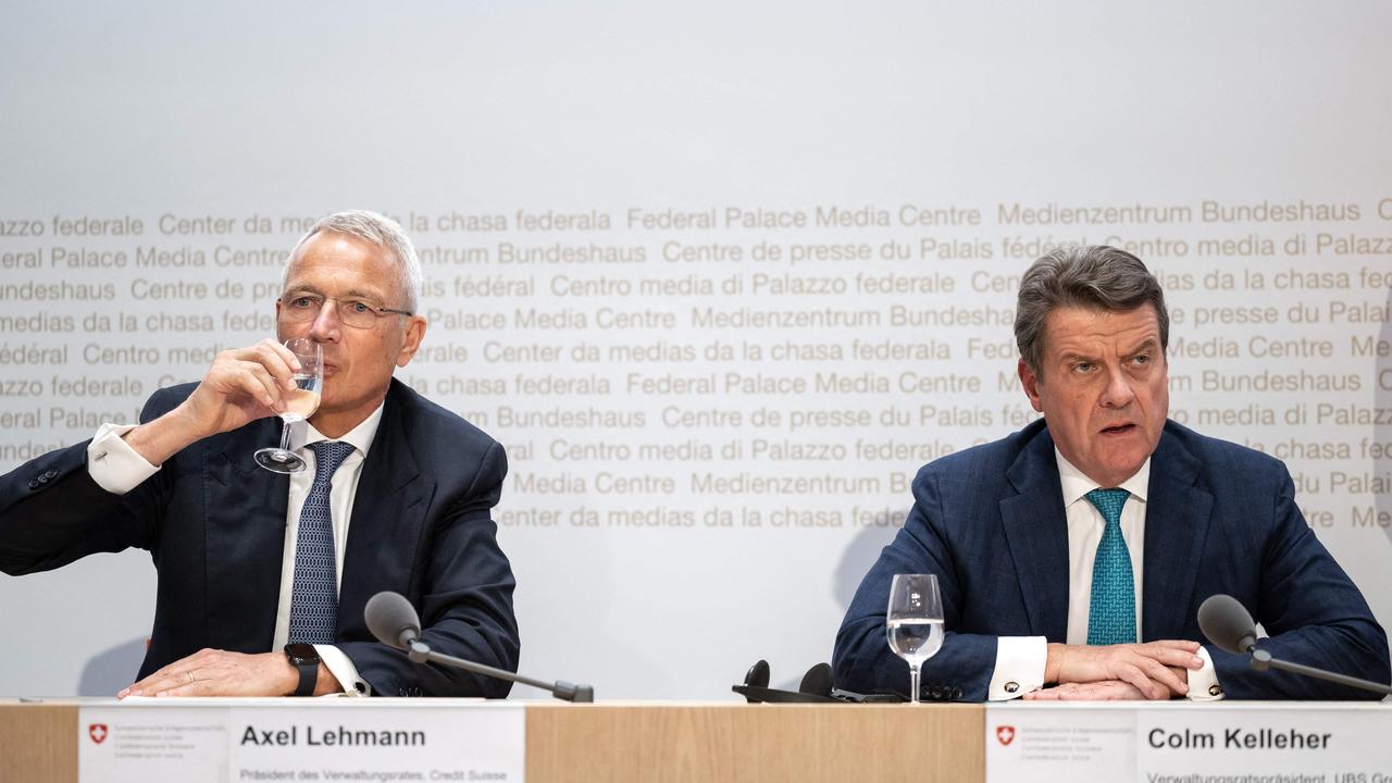 Credit Suisse chairman Axel Lehmann and UBS chairman Colm Kelleher in March after talks over UBS taking over its rival Swiss bank, Credit Suisse. Picture: AFP