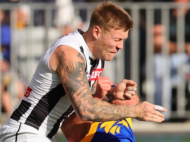 PERTH, AUSTRALIA - JUNE 03: Jordan De Goey of the Magpies bumps Elijah Hewett of the Eagles during the round 12 AFL match between West Coast Eagles and Collingwood Magpies at Optus Stadium, on June 03, 2023, in Perth, Australia. (Photo by Paul Kane/Getty Images)