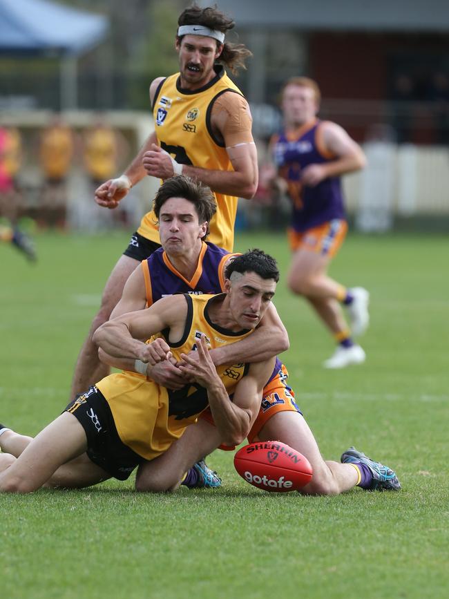 Ovens and Murray’s Jack Gerrish is tackled high by Goulburn Valley’s Lachie Hill. Picture Yuri Kouzmin