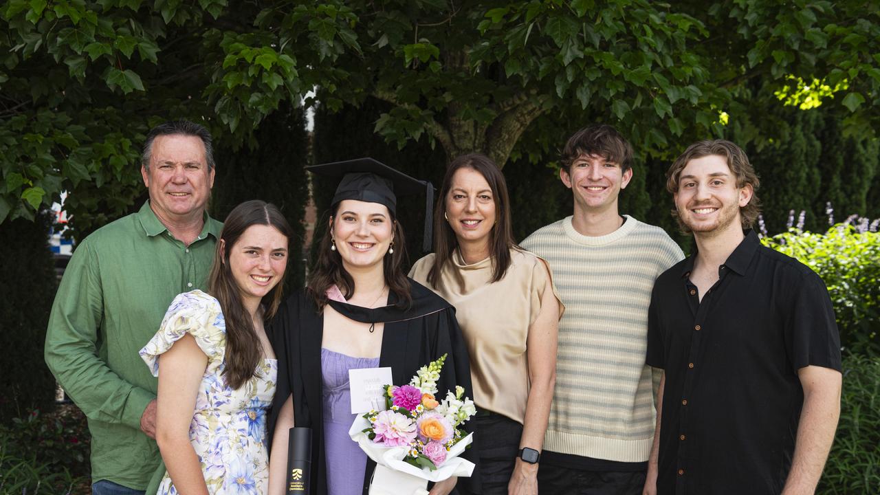 Bachelor of Education (Secondary) graduate Grace Trenaman with (from left) Peter, Lilah, Janelle and Isaac Trenam and Ashley Pailthorpe at a UniSQ graduation ceremony at The Empire, Wednesday, October 30, 2024. Picture: Kevin Farmer