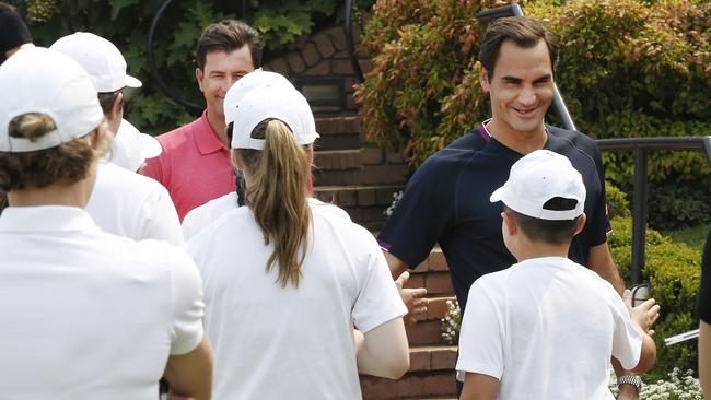 Tennis superstar Roger Federer appeared alongside Australian golf star Adam Scott for their mutual sponsor Uniqlo.