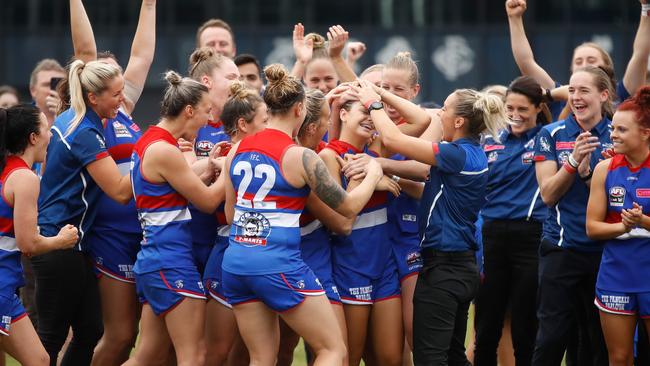 The Western Bulldogs celebrate their premiership win over the Brisbane Lions in March, but the women’s game is full of anger and frustration as a third season looms. Picture: Getty Images