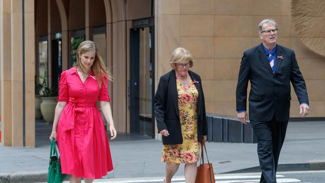 The brother of Lynette Dawson, Greg Simms (right) and his wife Merilyn (centre) arriving at court for the sentencing on Friday. Picture: NCA NewsWire / David Swift