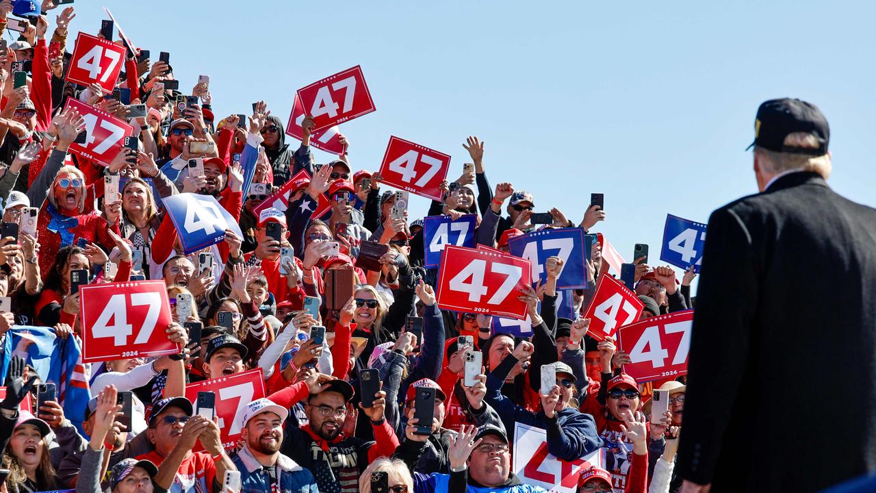 Mr Trump’s supporters wave ‘47’ signs at his New Mexico rally. If Mr Trump wins next week he will become the 47th American president (having already been the 45th). Picture: Chip Somodevilla/Getty Images via AFP