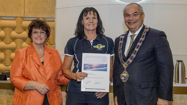 City of Gold Coast acknowledging Surf Lifesaving Queensland members who attended to a mass rescue at Tallebudgera/Palm Beach on Australia Day this year. Councillor Daphne McDonald, recipient Michelle Slattery and Mayor Tom Tate. Picture: Jerad Williams