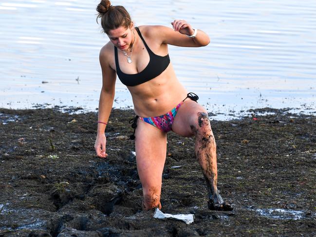 Brave Emmie Frederico, 18, wades through the ‘Black Death’. Picture: Penny Stephens