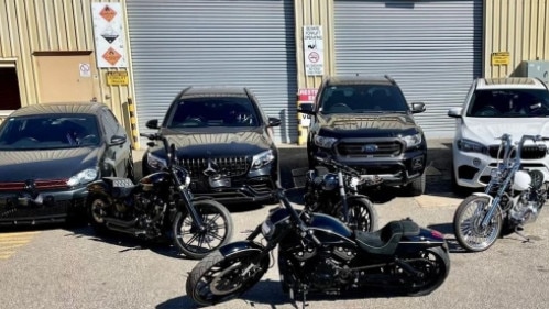 Five vehicles, as well as four Harley Davidson motorcycles and a jet ski, were seized in the raids. Picture: SA Police