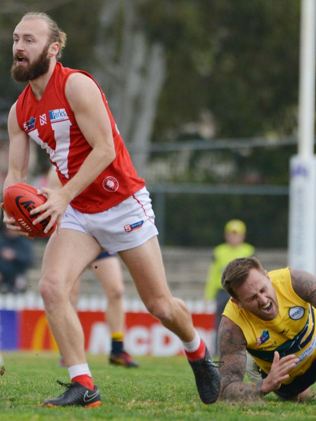 A painful end for Eagles champ Scott Lewis at Prospect Oval. Picture: AAP/Brenton Edwards)