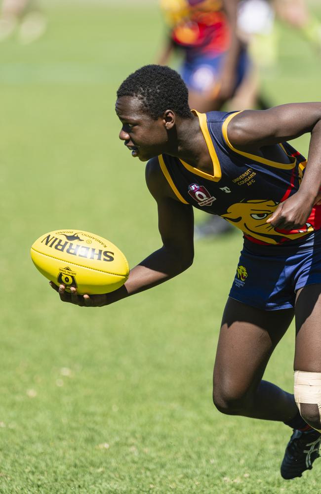 Kisubi Kimba of University Cougars against South Toowoomba Bombers in AFL Darling Downs under-14 mixed grand final at Rockville Park, Saturday, August 31, 2024. Picture: Kevin Farmer