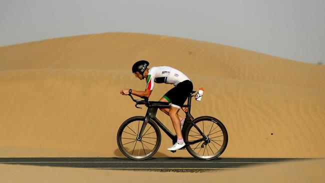 Triathlete Brett Hallam trains at the Al Qudra Cycling Track in Abu Dhabi, United Arab Emirates. Picture: Getty Images