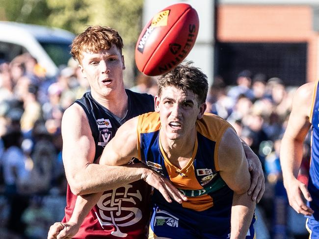 Golden Square's Tom Strauch and Sandhurst's Noah Walsh compete for the ball in the Bendigo league grand final. Picture: SAA Imaging