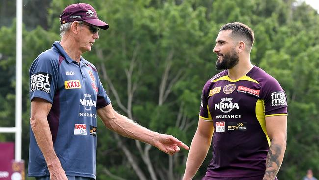 Coach Wayne Bennett speaks with Jack Bird during a Broncos training session.