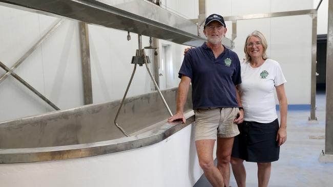 Mungalli Creek Bio-Dynamic Dairy owners Robert Watson and Michelle Bell-Turner in their new plant with cheddar vats in the new cheese making room. PICTURE: STEWART MCLEAN