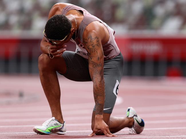 TOKYO, JAPAN - AUGUST 04:  Andre De Grasse of Team Canada reacts after winning the gold medal in the Men's 200m Final on day twelve of the Tokyo 2020 Olympic Games at Olympic Stadium on August 04, 2021 in Tokyo, Japan. (Photo by Christian Petersen/Getty Images)