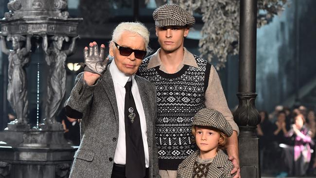 Karl Lagerfeld with model Baptiste Giabiconi and his godson Hudson Kroenig. 