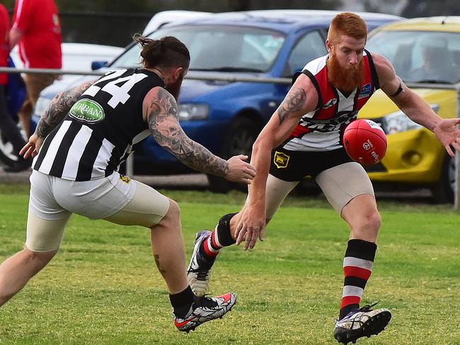 RDFL footy: Rockbank V Wallan. Wallans Shannon McLeish and Rockbanks Aiden O'Neil