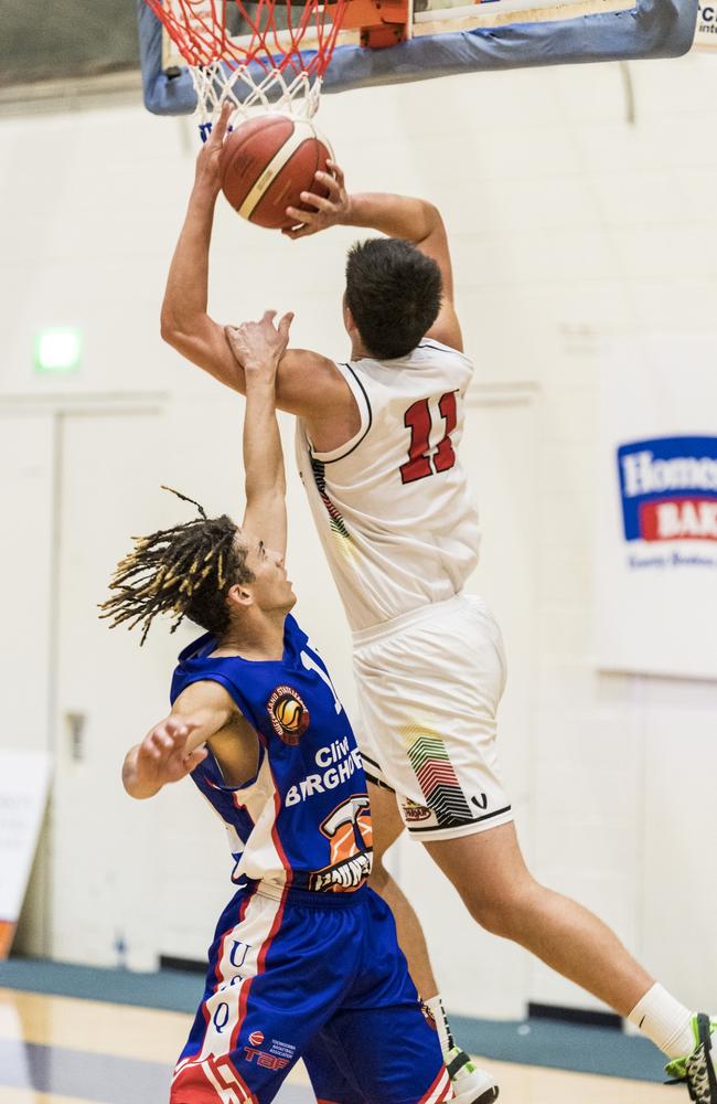 Mason Amos of SD Spartans attacks the basket in the QSL competition. Picture: Kevin Farmer