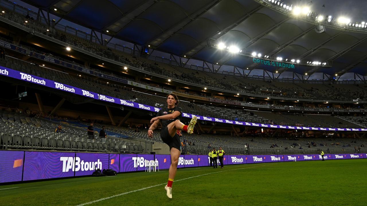 Bailey Humphrey warms up for the Q-Clash. Picture: Daniel Carson/AFL Photos via Getty Images