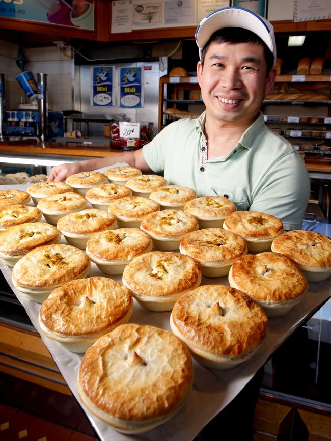 Mr Chin has a reason to grin — his steak and pepper pies are Australia's best. Picture: Nicole Cleary