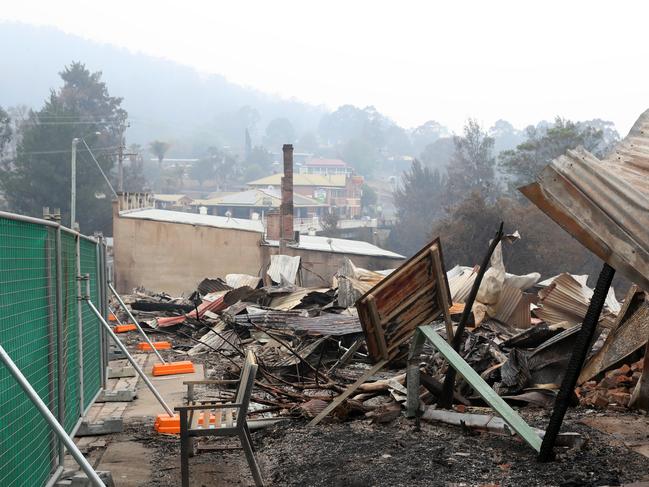 Buildings destroyed by the 's bushfire on the Princes Highway in the main street of Cobargo. The town has lost between 50-60 homes. Picture: Jonathan Ng